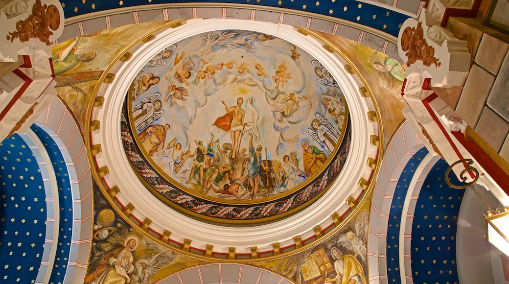 Church of San Juan which includes art, interior views and heritage elements