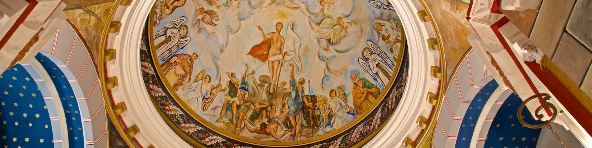 Church of San Juan which includes art, interior views and heritage elements