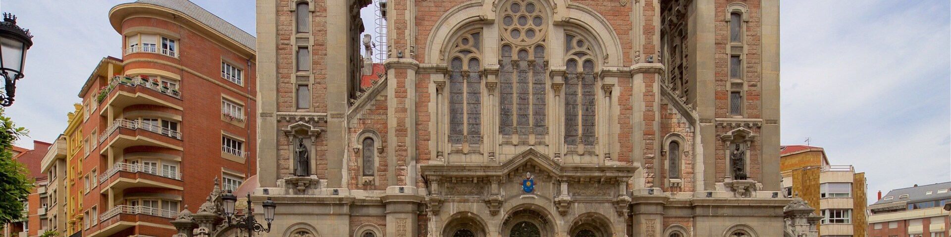 Church of San Juan which includes a church or cathedral, a city and heritage architecture