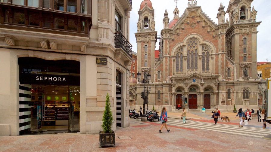 Church of San Juan featuring a church or cathedral, street scenes and heritage architecture
