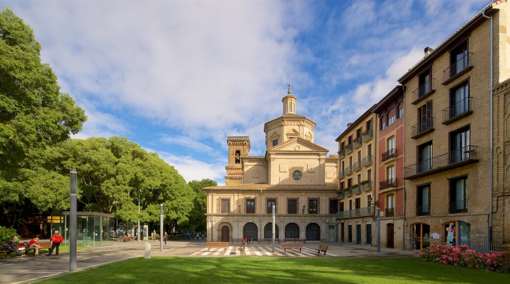 Parroquia San Lorenzo featuring heritage architecture, a square or plaza and a park