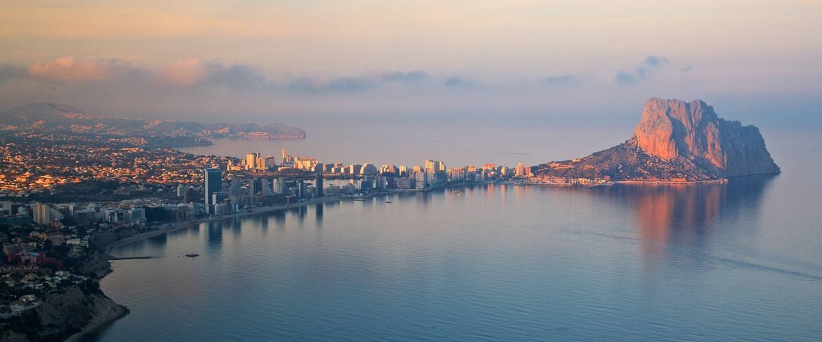 Mirador Monte Toix which includes mist or fog, island images and a coastal town