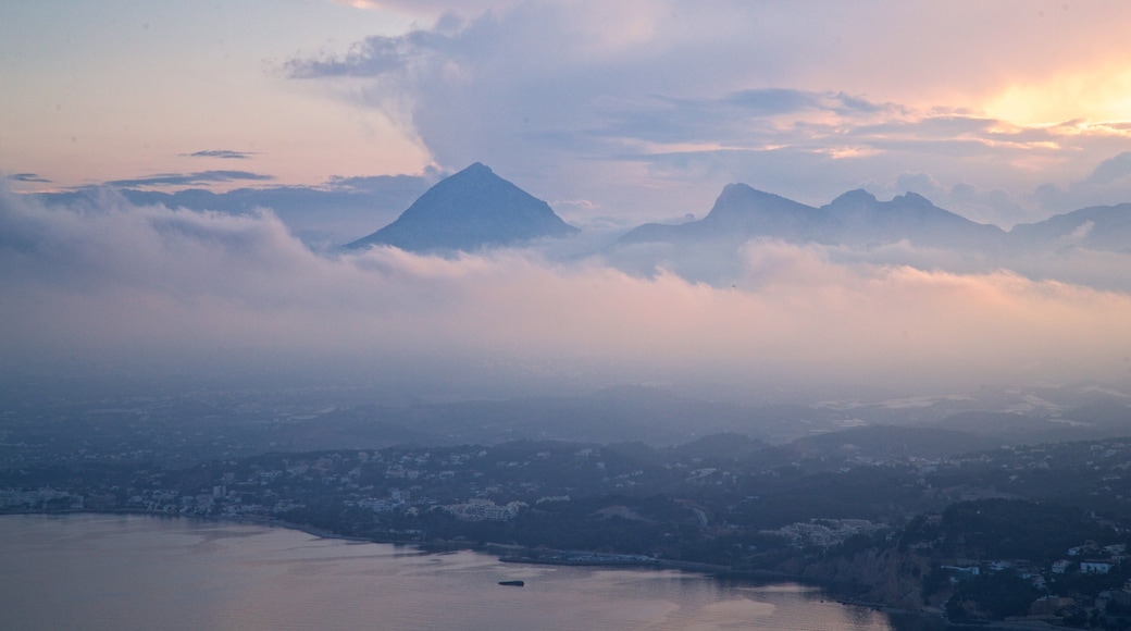 Mirador Monte Toix featuring a sunset, mountains and landscape views