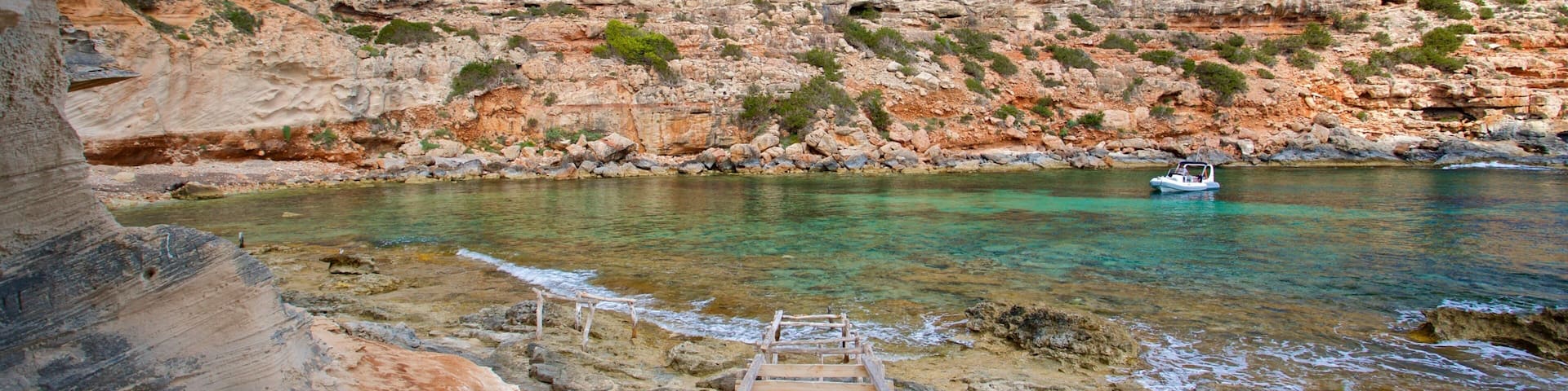 Cala en Baster showing rugged coastline and general coastal views