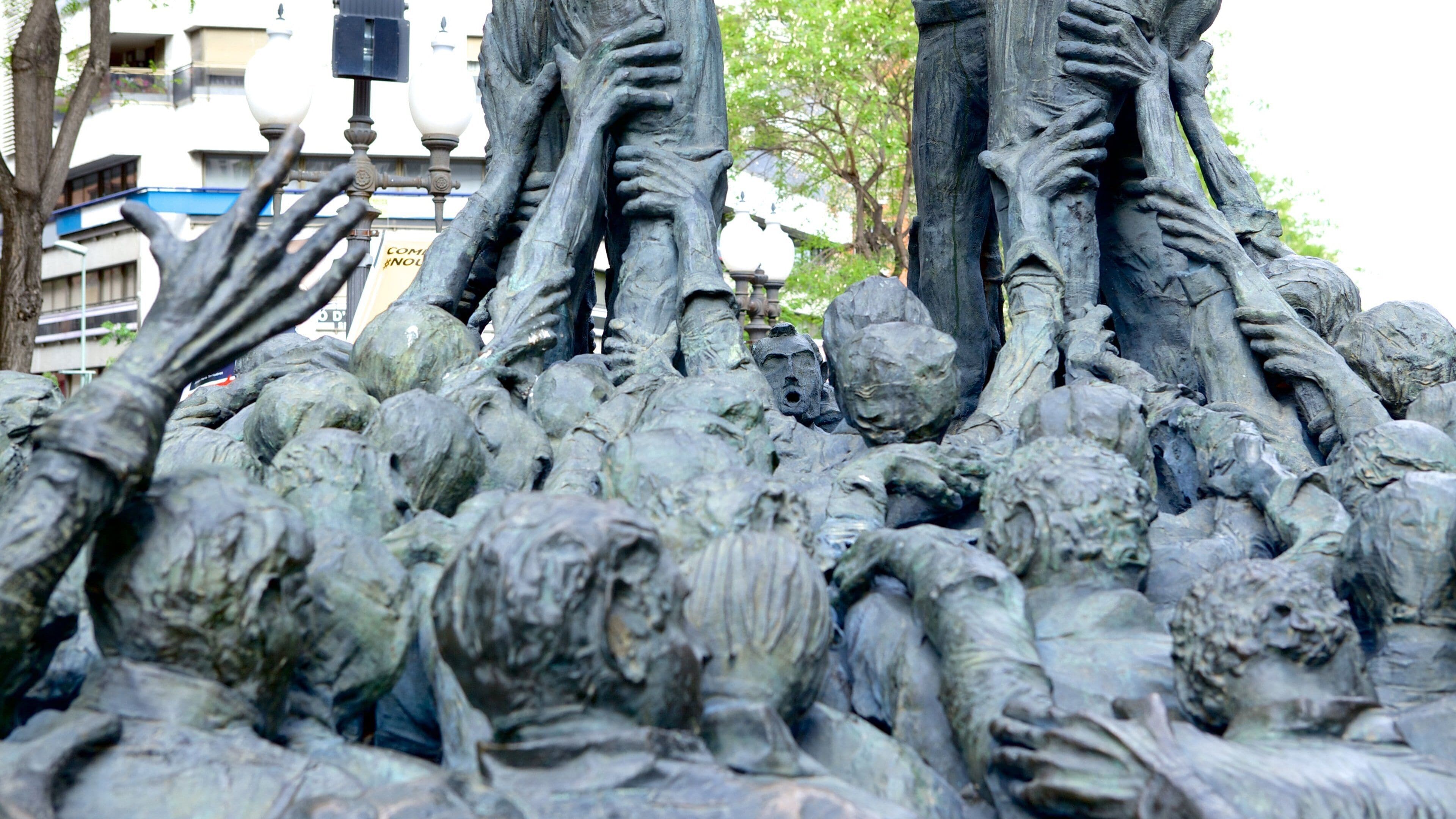 Catalonia featuring a statue or sculpture and a monument