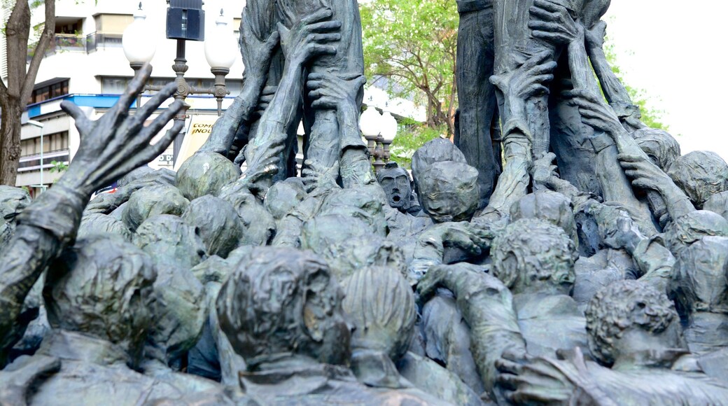 Catalonia featuring a statue or sculpture and a monument