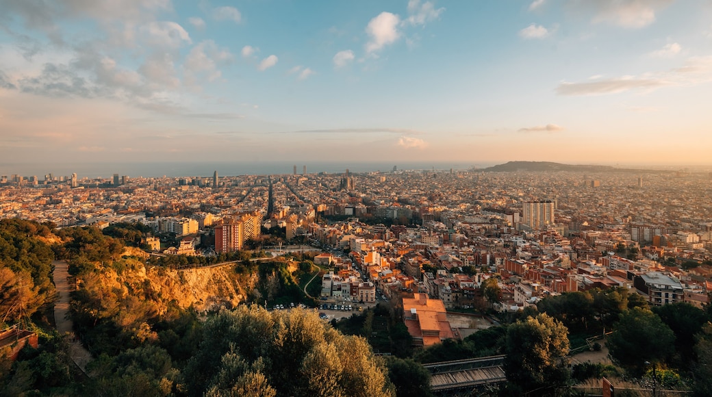 Sunset cityscape skyline view from Bunkers Del Carmel, in Barcelona, Spain