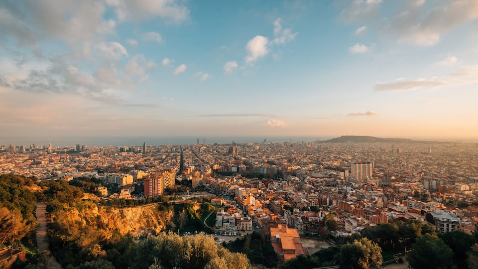 Sunset cityscape skyline view from Bunkers Del Carmel, in Barcelona, Spain