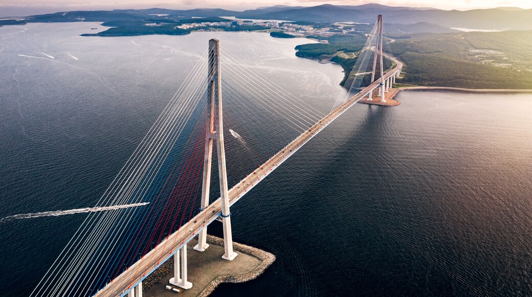 Aerial view of the Russky Bridge from Vladivostok city to Russky Island over the Strait of Eastern Bosphorus. Cable-stayed bridge in Primorsky Krai, Far East, Russia