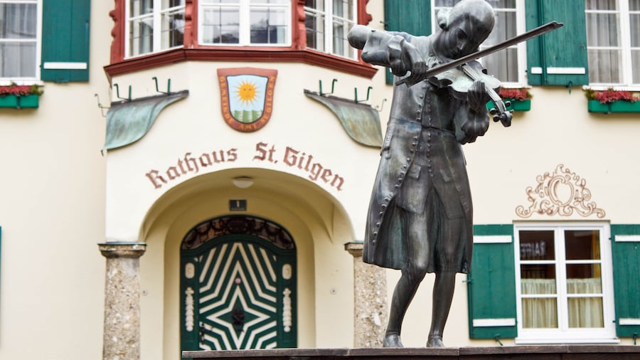Statue of young Wolfgang Amadeus Mozart in front of townhall on Mozartplatz in St. Gilgen, Austria