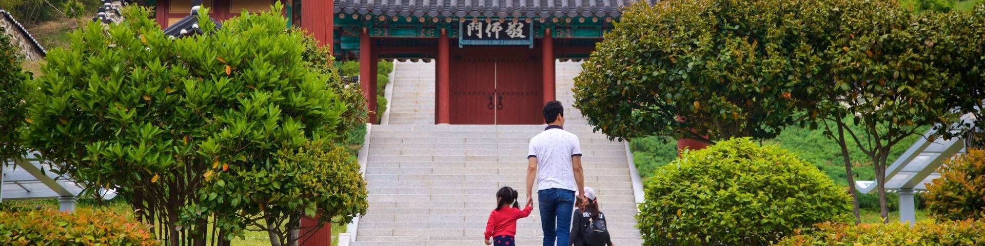 Geoje Okpo Daecheop Ginyeom Park showing heritage elements as well as a family