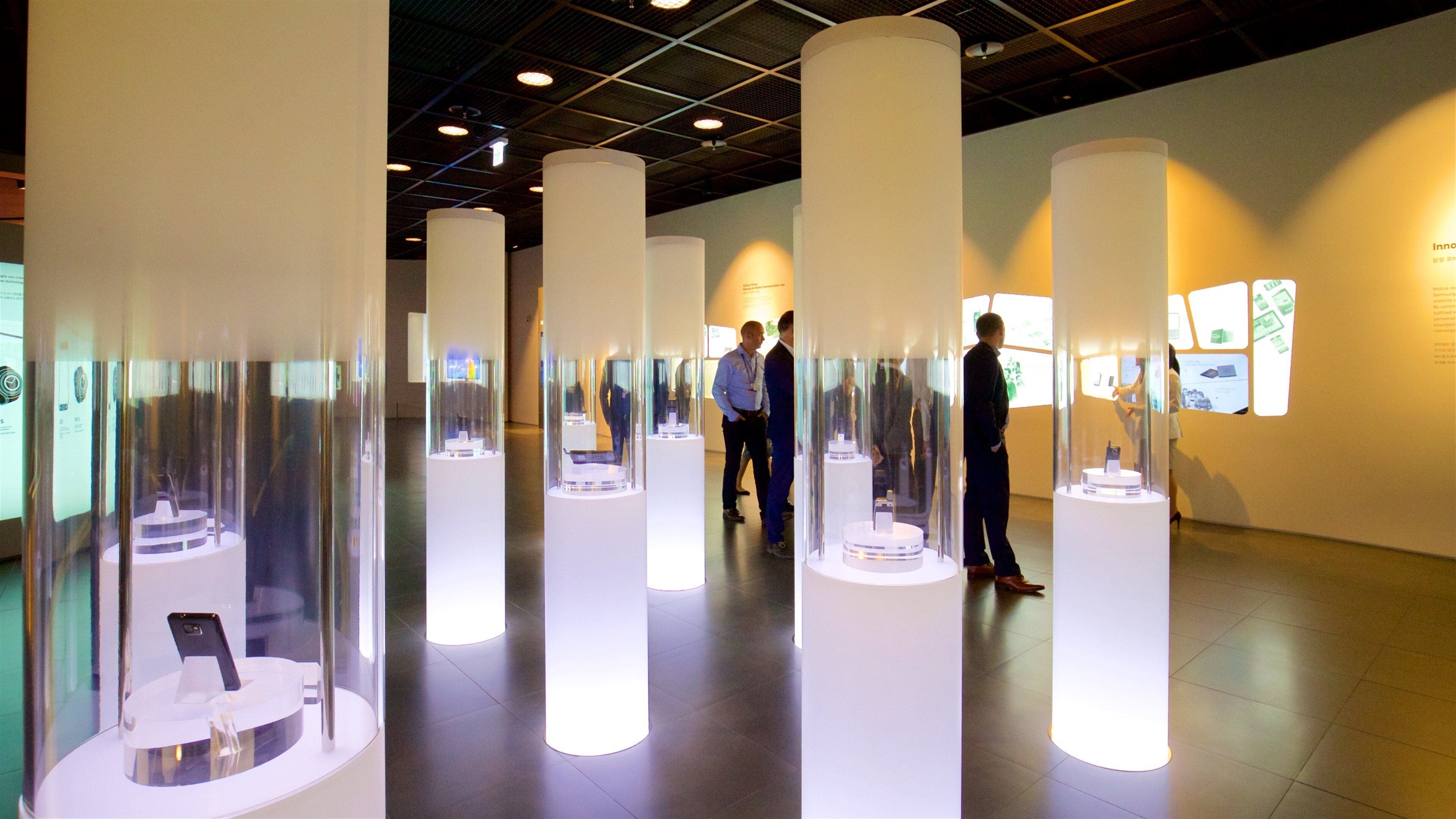 Samsung Innovation Museum featuring interior views as well as a small group of people