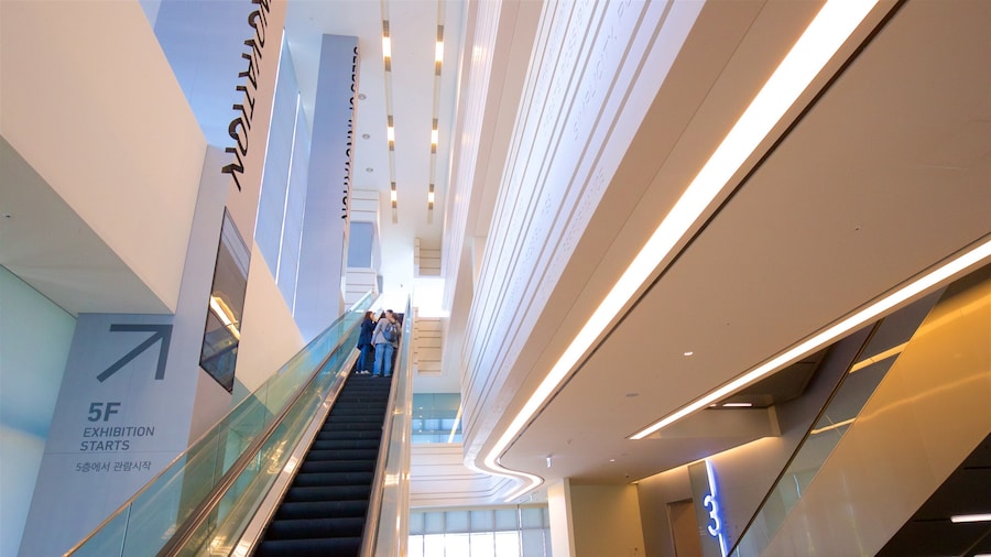 Samsung Innovation Museum featuring interior views as well as a small group of people