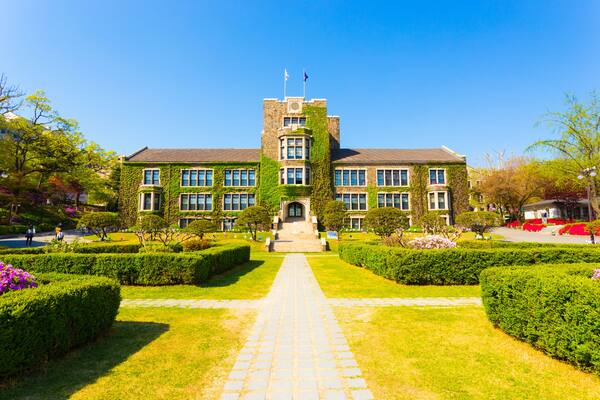 Grassy walking path leading to ivy covered main building at venerable Yonsei University in Sinchon, Seoul, South Korea. Horizontal, Shutterstock ID 549571837, SF SSA Case with Manager Approval: Case 0