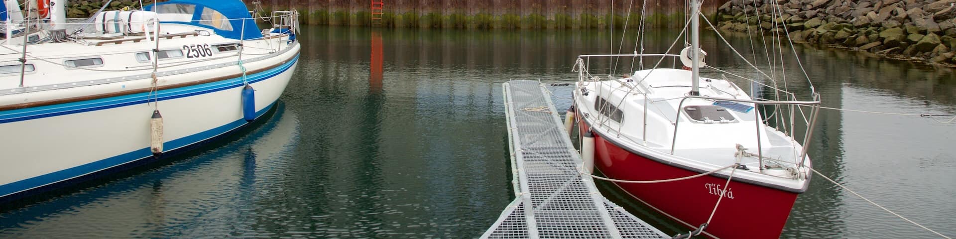 Akureyri featuring sailing and a bay or harbor