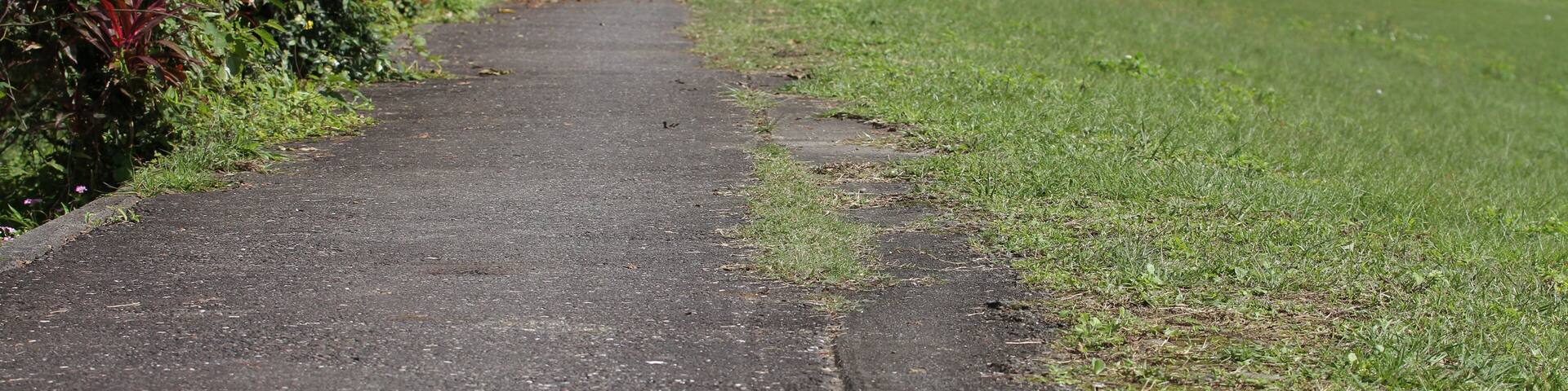 A straight road nearby the meadow and river in Yilan, Taiwan.; Shutterstock ID 1031391493; purchase_order: SF 06557000; job: ; client: ; other: