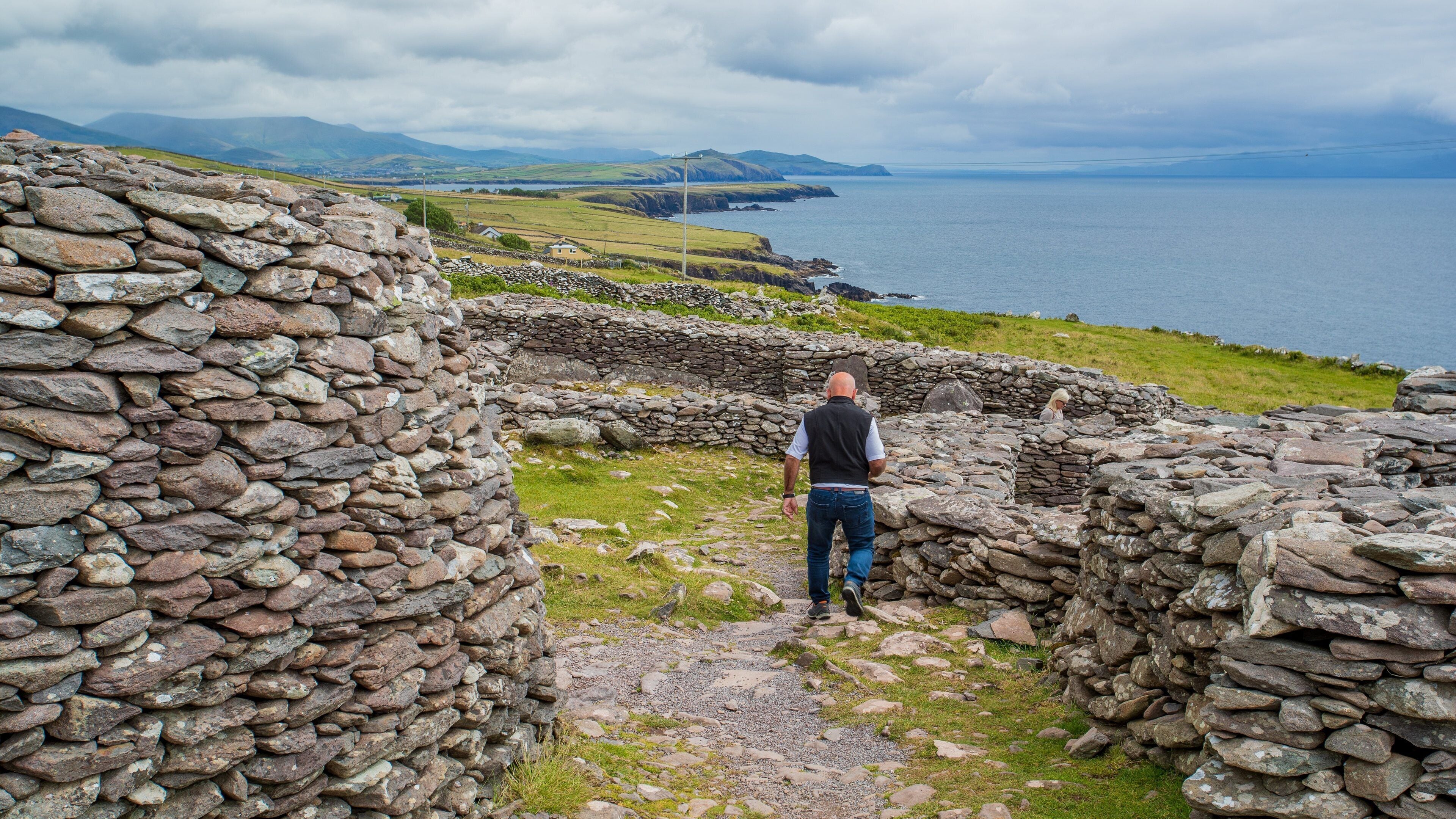 Fahan BeeHive Huts featuring heritage elements and building ruins as well as an individual male