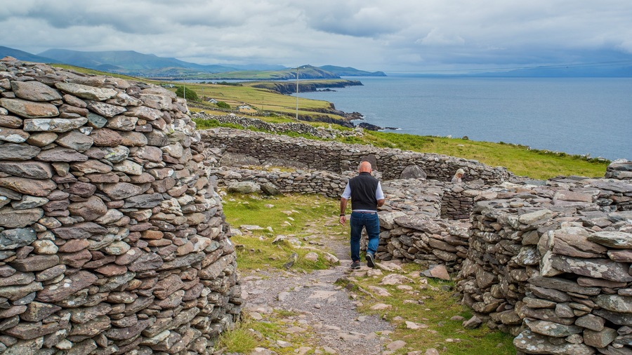 Fahan BeeHive Huts featuring heritage elements and building ruins as well as an individual male