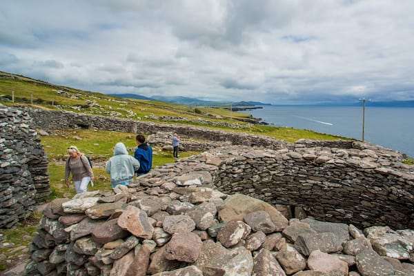 Fahan BeeHive Huts showing heritage elements as well as a small group of people