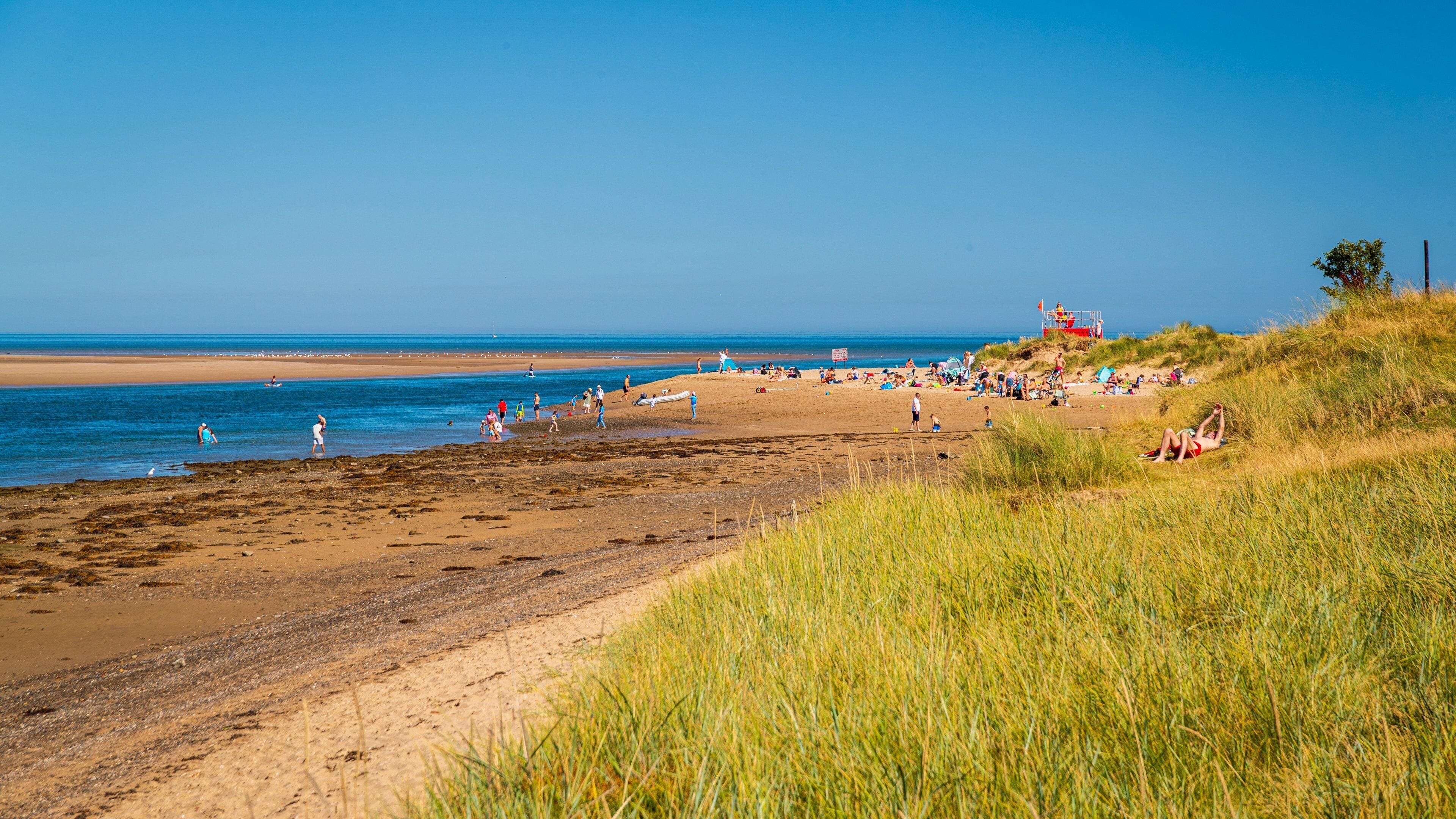 Malahide Beach showing a sandy beach and general coastal views