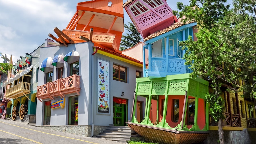 Tbilisi, Georgia - June 2019: Tilting houses in Mtatsminda amusement park