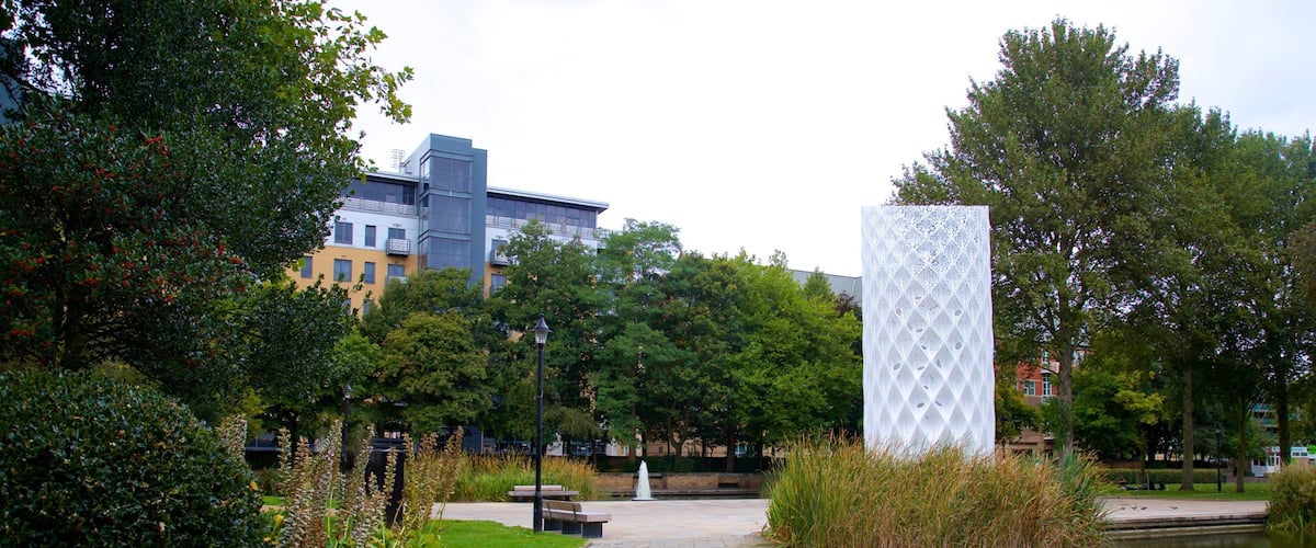 Queen\'s Gardens featuring a park and outdoor art