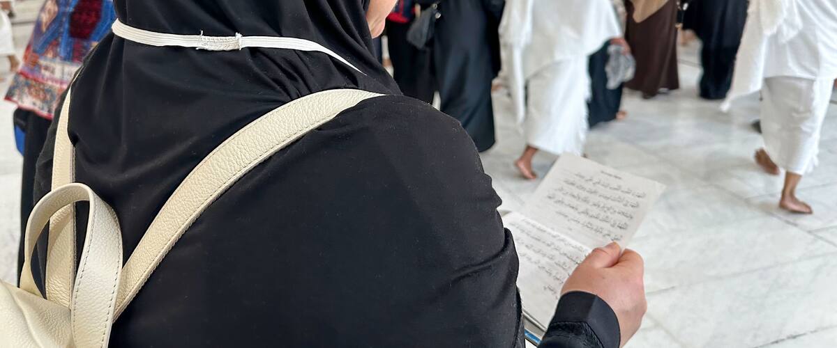 A female pilgrim performs Umrah, walks between Safa and Marwa and reads prayers in the Sacred Mosque of Al Haram in Mecca.