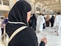 A female pilgrim performs Umrah, walks between Safa and Marwa and reads prayers in the Sacred Mosque of Al Haram in Mecca.