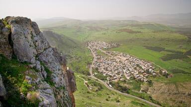 Mount Arbel which includes landscape views, tranquil scenes and a small town or village