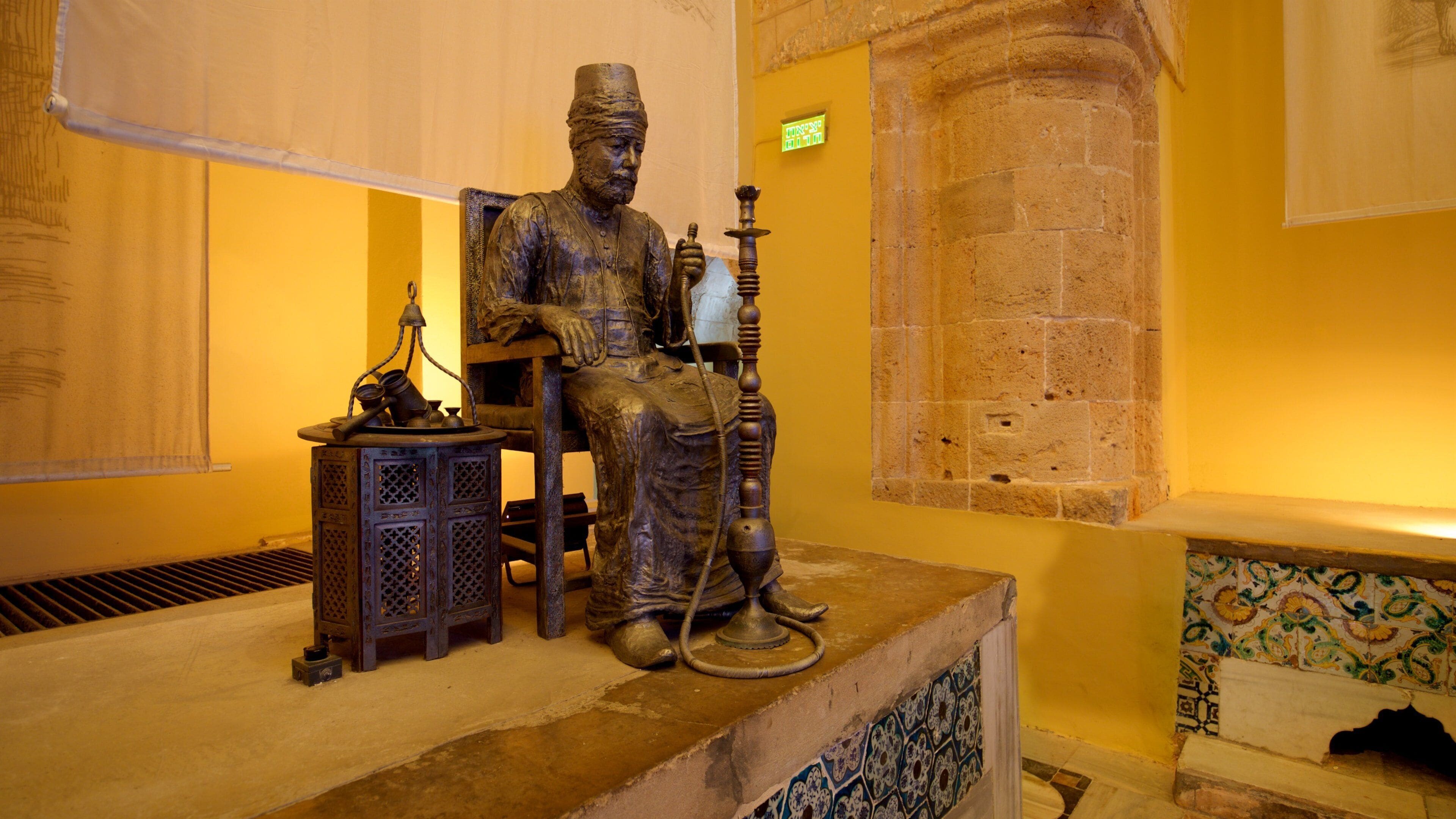 Hamam al- Basha Turkish Bath which includes heritage elements, interior views and a statue or sculpture