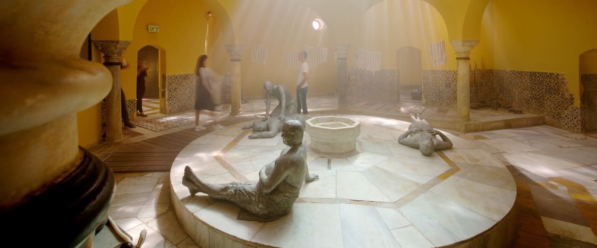 Hamam al- Basha Turkish Bath featuring interior views, heritage elements and a statue or sculpture