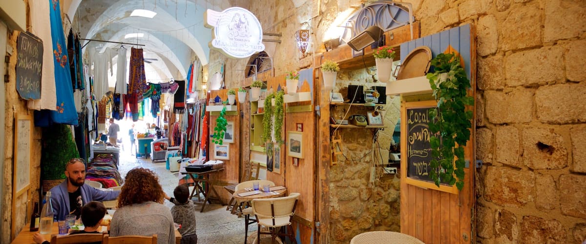 Turkish Bazaar featuring cafe lifestyle as well as a family
