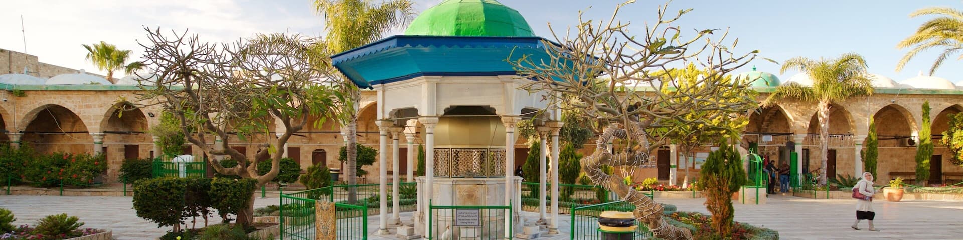 Al-Jazzar Mosque featuring heritage elements and a square or plaza