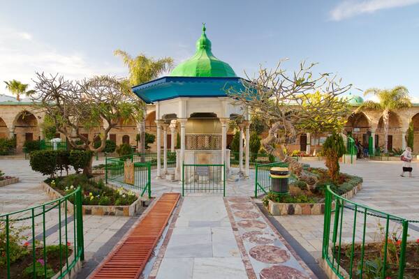 Al-Jazzar Mosque featuring heritage elements and a square or plaza