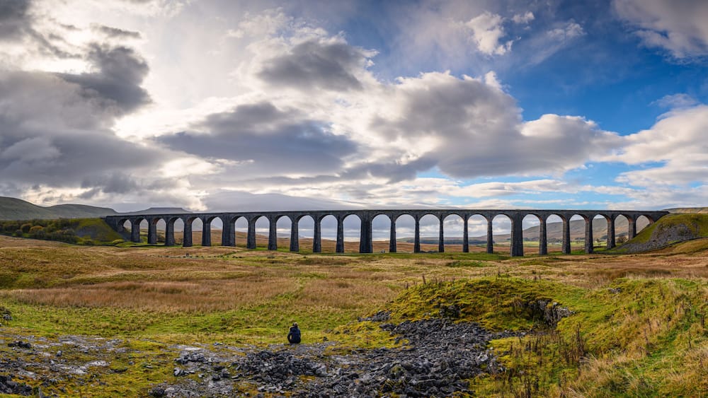 Panorama of Ribblehead Viaduct, which carries the Settle to Carlisle Railway across Batty Moss spanning 400 m and 32 m above the valley floor