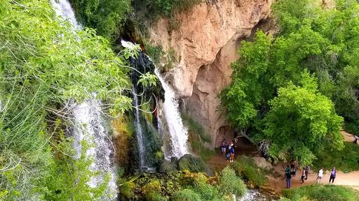 There is a short walk to the falls from the campsites. Way back in the day it was just a river with a high concentration of calcium. Over the years, the calcium built up and created the falls and some neat caves! It's a fun place to explore!!