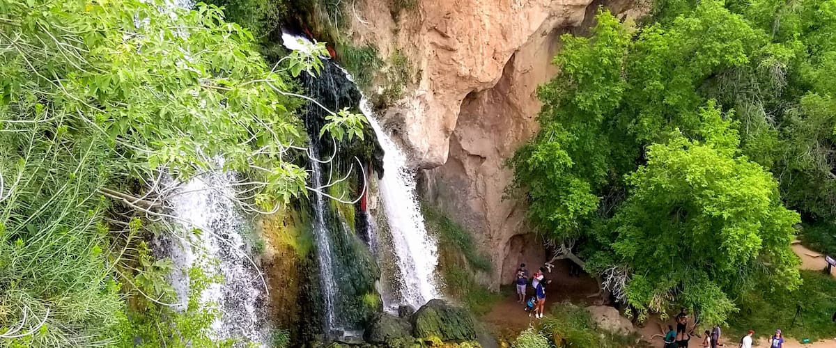 There is a short walk to the falls from the campsites. Way back in the day it was just a river with a high concentration of calcium. Over the years, the calcium built up and created the falls and some neat caves! It's a fun place to explore!!
