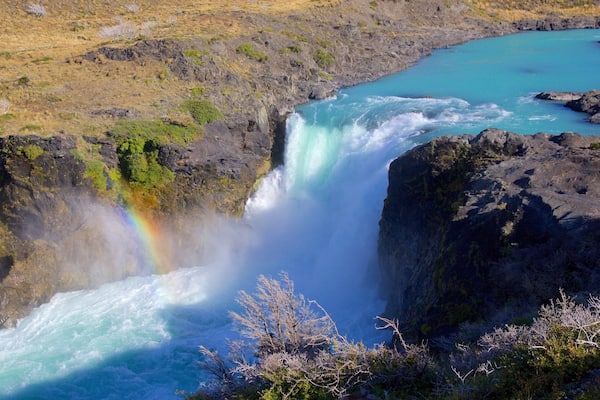 Torres Del Paine featuring a waterfall and a river or creek