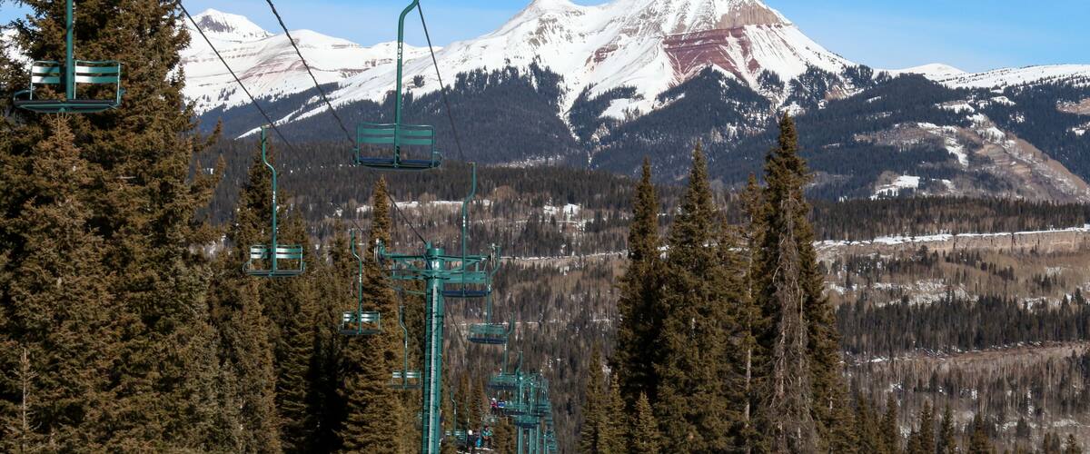 Two person green chair lift and Engineer mountain