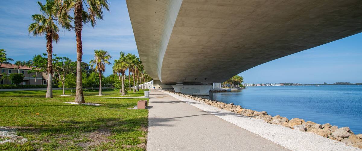 Causeway Park which includes a park, general coastal views and a bridge