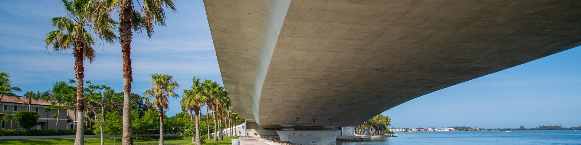 Causeway Park which includes a park, general coastal views and a bridge