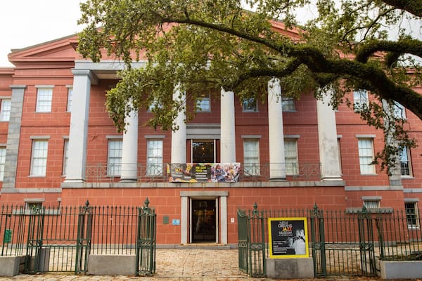 New Orleans Jazz Museum featuring signage and heritage architecture