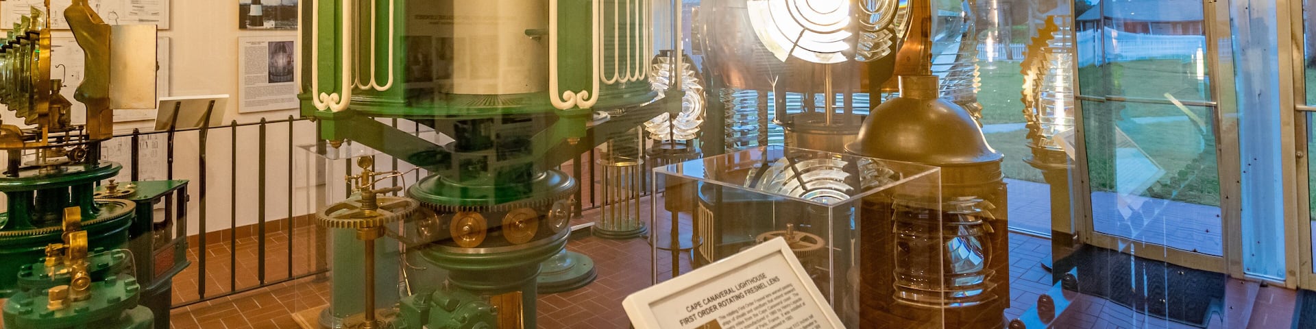 Ponce de Leon Inlet Lighthouse and Museum featuring a lighthouse and interior views
