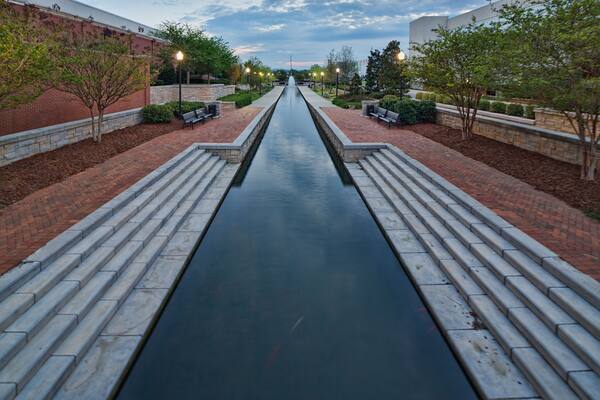Evening time at a canal ending with a fountain, in Big Spring Park, Huntsville, Alabama