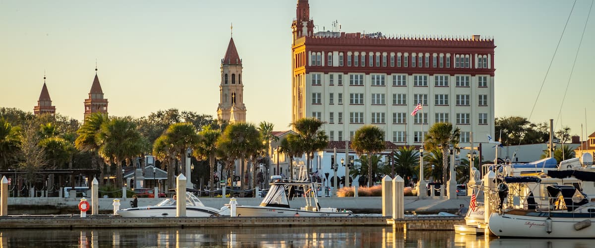 St. Augustine Municipal Marina featuring a sunset and a bay or harbor