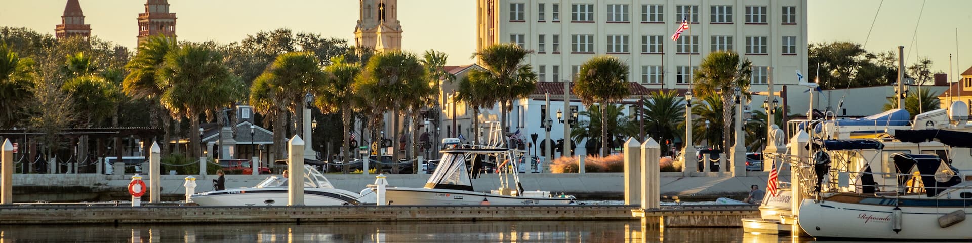 St. Augustine Municipal Marina featuring a sunset and a bay or harbor