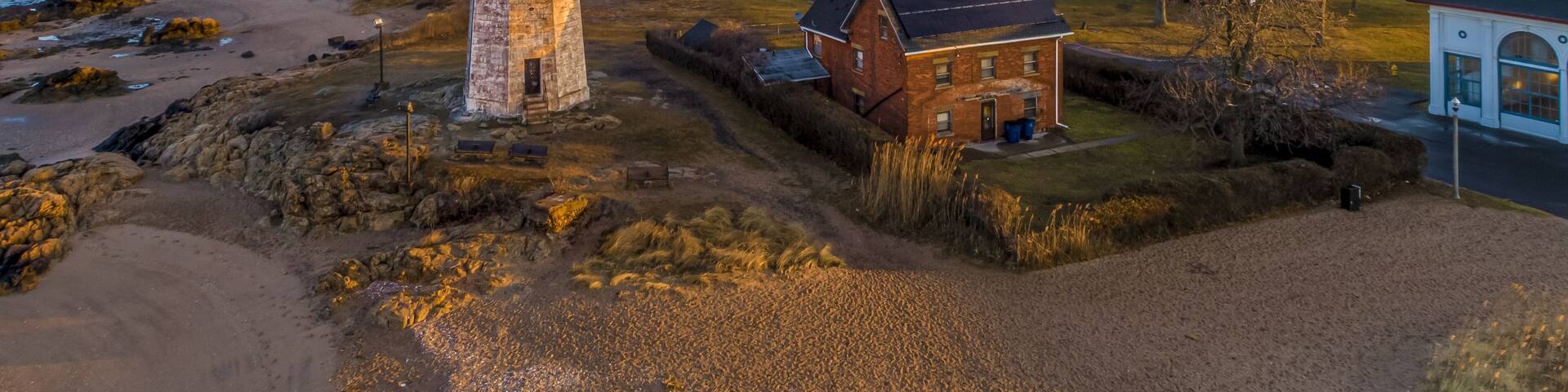Lighthouse with Sunrise reflection