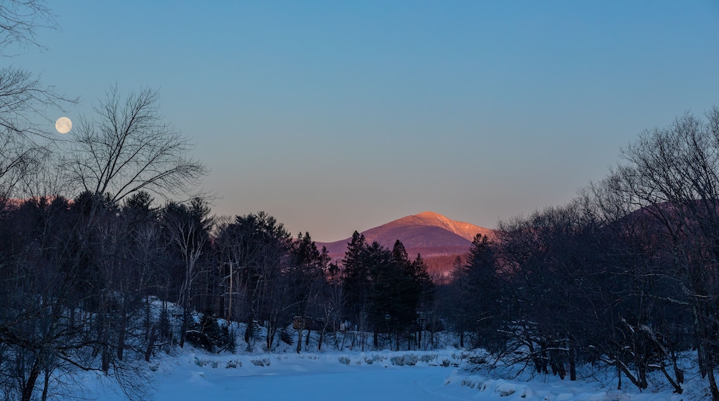 Sunrise hits Spaulding Mountain. This is in the Sugarloaf area, Spaulding is between Sugarloaf and the town of Kingfield. Photograph is looking north up the Carrabassett River in February of 2019.