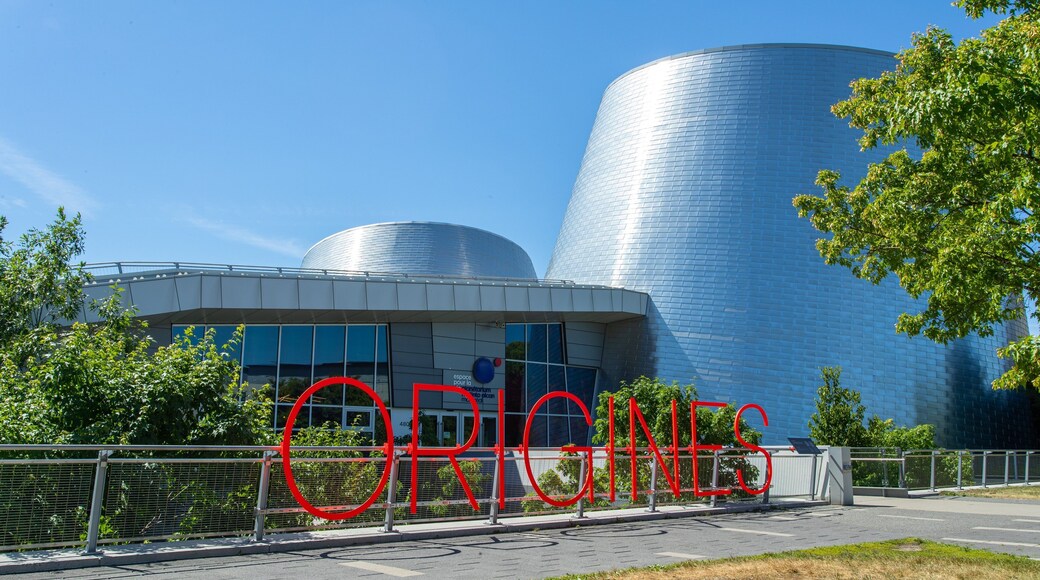 Montreal Planetarium which includes signage and modern architecture