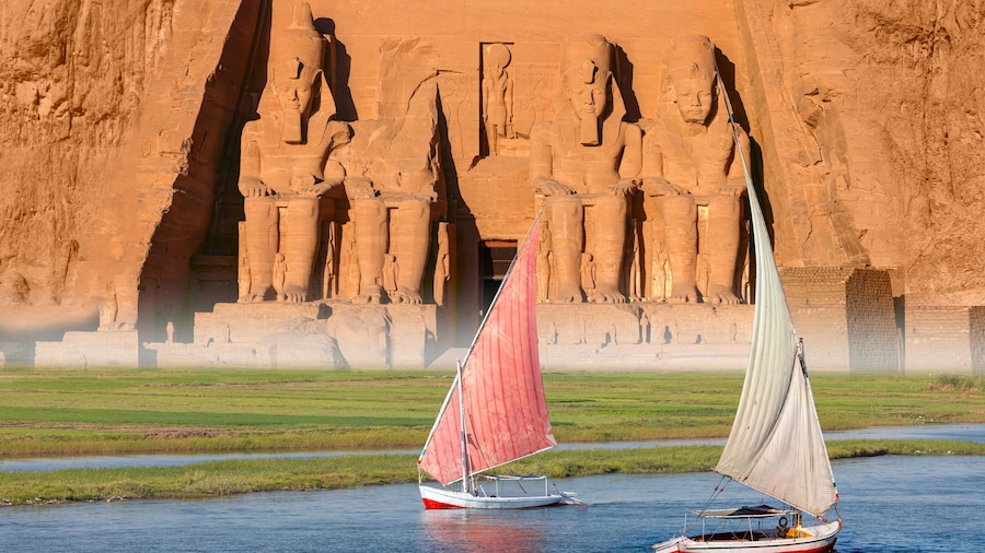 Beautiful Nile scenery with sailboat in the Nile on the way to The Front of the Abu Simbel Temple - Egypt, Africa